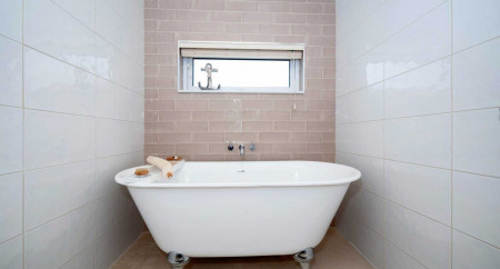 Interior shot of a bathroom with freestanding rolltop bath